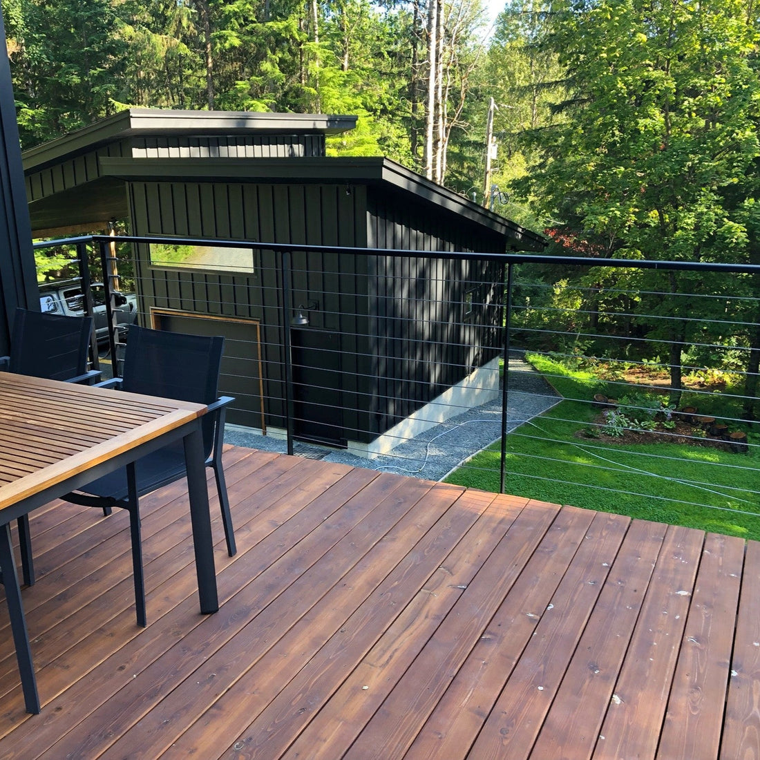 Black metal post cable railing project in Terrace, British Columbia