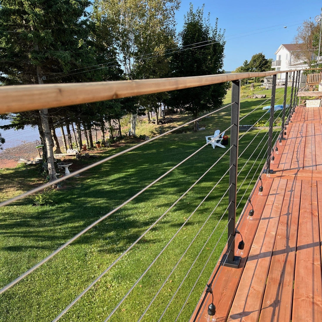 Black metal post cable railing project in Prince Edward Island, Canada